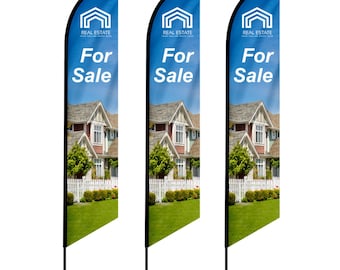 May include: Three custom feather flags with a blue background and a house image. The flags have the text "REAL ESTATE" and "For Sale" printed on them.