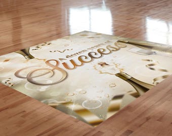 May include: A rectangular graphic with a champagne theme, featuring the words "A dozen years of Success" in gold script. Champagne bottles, glasses, and confetti are scattered across the beige background, creating a celebratory atmosphere.