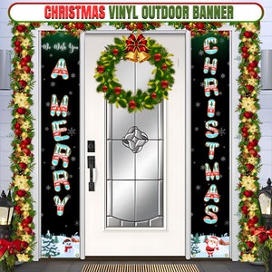 May include: Two Christmas banners with a black background and white snowflakes. The left banner says "We Wish You A Merry" with a red and white knitted pattern. The right banner says "Christmas" with a red and white knitted pattern. A wreath with red berries and gold bells hangs on a white door.