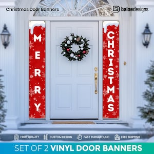 May include: Set of two red vinyl door banners with white snowflakes and the words "Merry" and "Christmas" in white. The banners are hanging on a white door with a wreath.