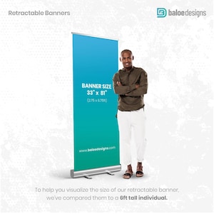 a man standing in front of a banner
