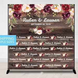 May include: A rustic wooden backdrop with a floral design in shades of burgundy, pink, and white. The text "Ruben & Lauren" is printed on the backdrop, along with the date "September 16, 2020".