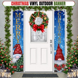 May include: Two Christmas banners with a gnome design. The banner on the left says "Merry" in gold letters on a blue background with snowflakes. The banner on the right says "Christmas" in gold letters on a blue background with snowflakes. Both banners feature a gnome with a red hat and a white beard.