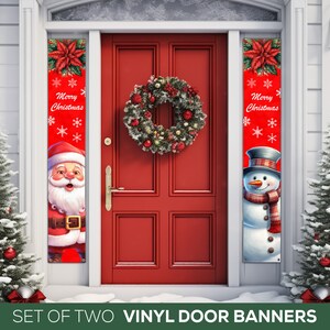 May include: Set of two vinyl door banners featuring a red background with a snowman and Santa Claus. The banners have the text "Merry Christmas" on them.