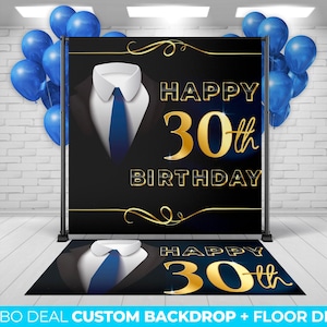 May include: A black and gold backdrop with the text "Happy 30th Birthday". The backdrop features a gold suit and tie design. A matching floor decal with the same design is also included.