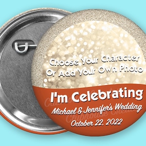 May include: A round button with a gold glitter background and a red and white stripe at the bottom. The text on the button reads "Choose Your Character Or Add Your Own Photo I'm Celebrating Michael & Jennifer's Wedding October 22, 2022".