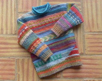 6-7 years. Colorful wool sweater hand knitted