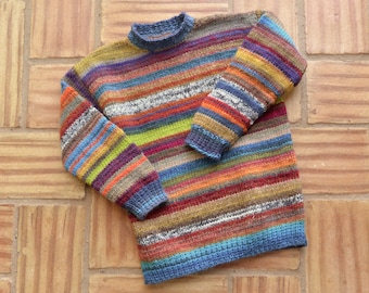 ten years. Colorful wool sweater, striped children's sweater. Hand knitted