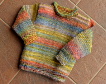about 3 years. Colorful children's sweater gradient. hand knitted