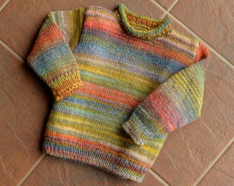 about 3 years. Colorful children&#39;s sweater gradient. hand knitted