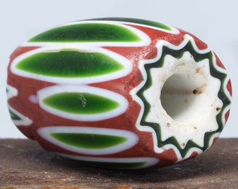 Antique six layers green and red chevron glass bead. Late 19th C. African Trade. Tribal, ethnic jewelry