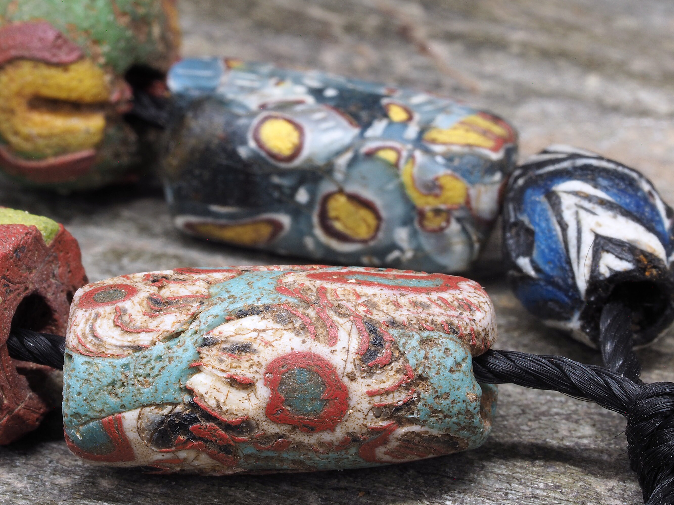 7 Ancient Medieval Islamic Glass Beads. 900-1200 CE. Western