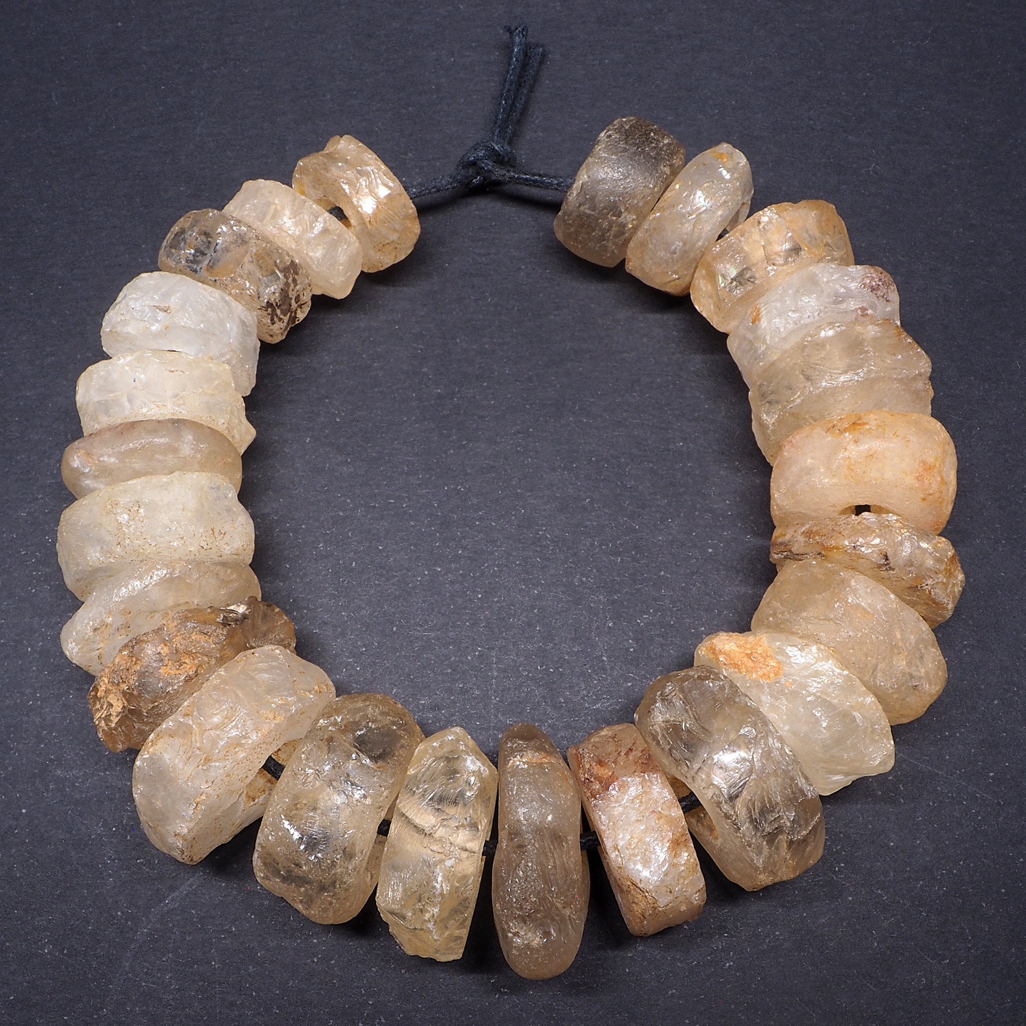 Ancient rock crystal beads strand. 7’’. West Africa. Tribal, ethnic jewelry