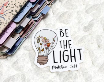 Adesivo de vinil recortado com o versículo "Seja a Luz" | Brilhante