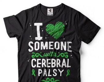 May include: Black t-shirt with the text "I LOVE SOMEONE with CEREBRAL PALSY" in white and green. The design includes a green heart and green ribbons. The shirt is a crew neck and has a tag on the upper right.