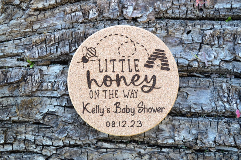 Personalized engraved cork coasters, used for baby shower and gender reveal. They are made of high quality natural cork. An excellent gift for guests and loved ones.