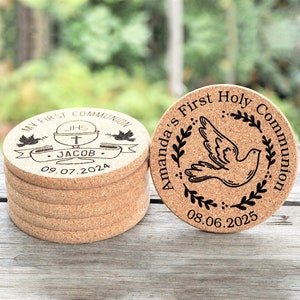 Personalized engraved cork coasters, used for first communion parties. They are made of high quality natural cork. On a wooden table. An excellent gift for guests and loved ones.