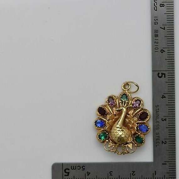 Peacock antique gold best sale pendant