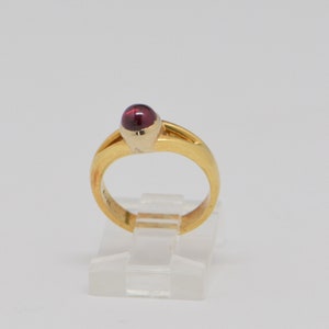 18K Yellow Gold Ruby Cabochon Ring Circa 1970, size 4+