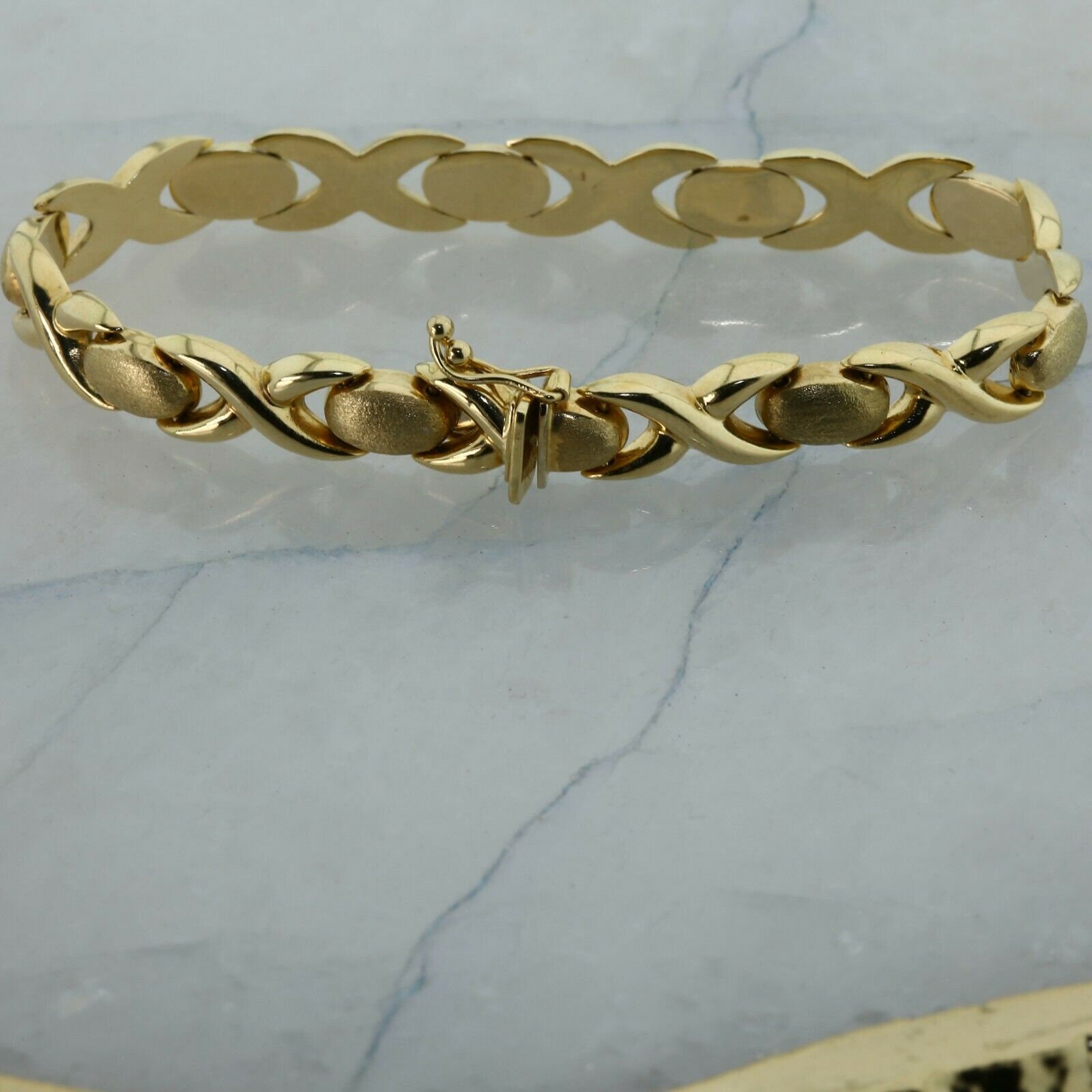 Hugs and kisses gold best sale bracelet