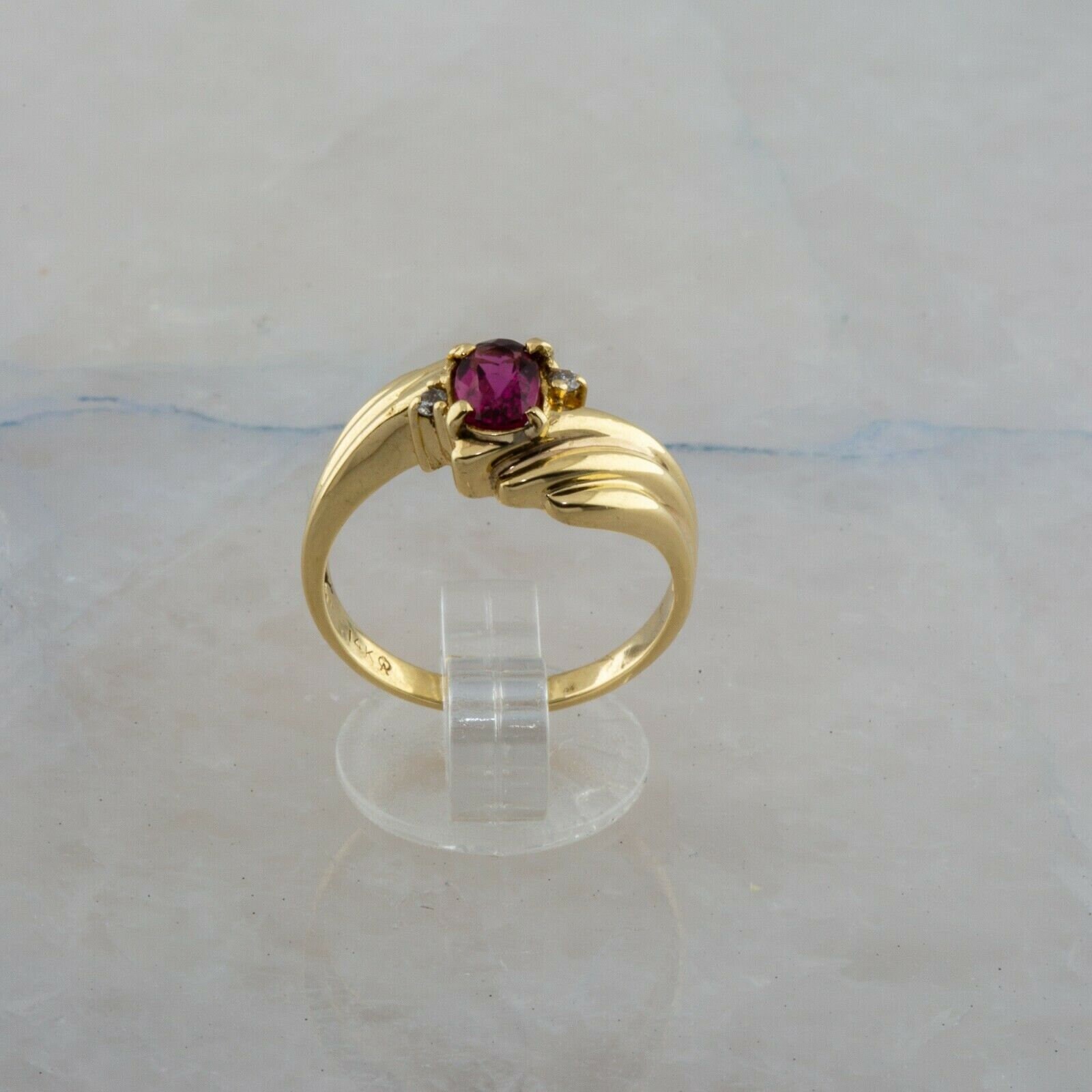 14K Yellow Gold Oval Ruby and Diamond Chip Bypass Ring Size 14K Yellow Gold Oval Ruby and Diamond Chip Bypass Ring Size