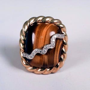 1970s Massive 14K Yellow Gold Tiger Eye Ring with Diamond Swirl, Size 6
