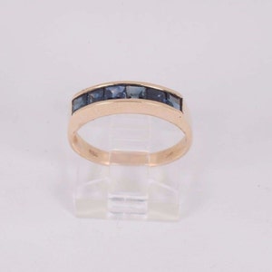 14K Yellow Gold Channel Band with Sapphire , size 6.5