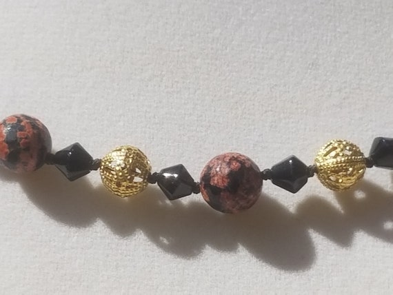 Red Snowflake Jasper and Brass Filigree
