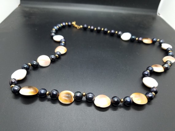 Brown Spiral Shells with Black Fresh-Water Pearls