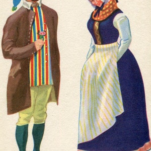 May include: A man and a woman in traditional Danish clothing. The man is wearing a brown coat, a striped shirt, and a blue and red hat. The woman is wearing a white cap, a blue dress with a white apron, and a yellow and orange scarf.