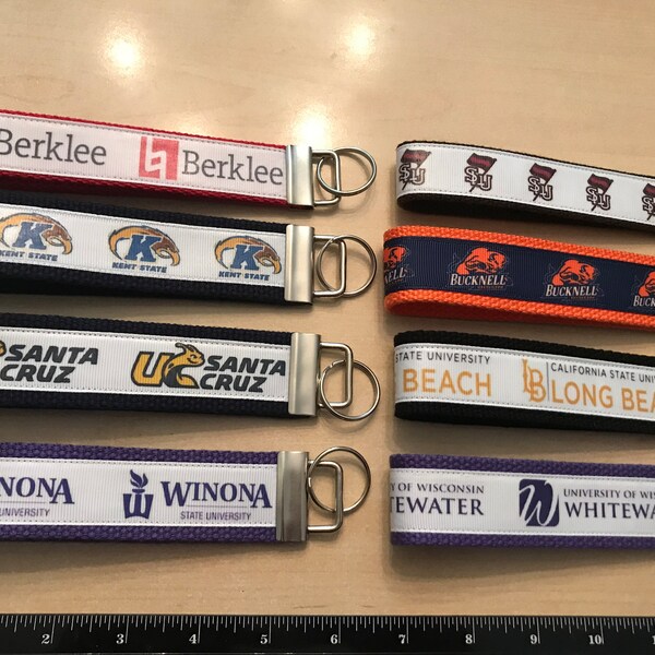 70)College Team Inspired Key Fobs (Key Chains)/Wristlets (approx 5")