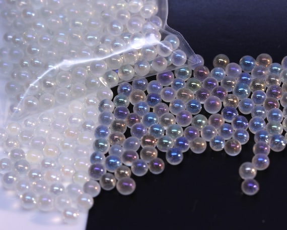 Acrylic paint glass spheres beads light night time reflective coating.