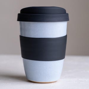 Handmade Ceramic Travel Mug with Silicone Lid and Sleeve - Light Blue