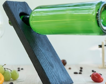 Handmade wooden gravitational wine rack
