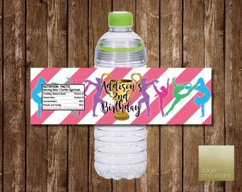 May include: Pink and white striped water bottle label with a gold trophy and the text "Addison's 2nd Birthday". The label also features silhouettes of gymnasts in various poses.