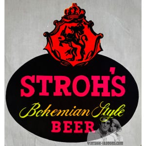 May include: A black and white oval sticker with the text "STROH'S Bohemian Style BEER" in pink and yellow. A red and black crest with a lion is at the top of the sticker.