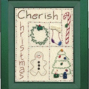 May include: Embroidered framed artwork with the word "Cherish" and the word "Christmas" spelled vertically. The artwork features a wreath, a stocking, a candy cane, a gingerbread man, and a Christmas tree.