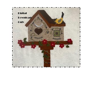 May include: A felt birdhouse design with a brown roof, tan walls, and a heart-shaped cutout. A yellow bird perches on top. The birdhouse is on a brown post adorned with red flowers and green leaves. The text "WELCOME" is above the heart. The words "Digital Download Only" are in the upper left corner.