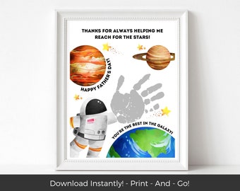 May include: A printable Father's Day card featuring a handprint, an astronaut, planets, and stars. The text reads "Thanks for always helping me reach for the stars! Happy Father's Day! You're the best in the galaxy!"
