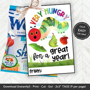 May include: A printable gift tag featuring a cartoon caterpillar with the text "Very Hungry for a Great Year!" and a space to write "from:".