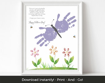 May include: A purple handprint butterfly with three pink, orange, and red finger-painted flowers. The image includes the text "This isn't just a butterfly as you can plainly see. I made it with my hand which is a part of me. It comes with lots of love especially to say I hope you have a very Happy Mother's Day!"