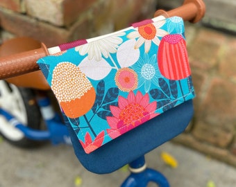 Bike & Scooter Flap Handlebar Basket | 6 Way Push Clip on | Blue Flowers + Blue | Bike | Scooter | Tricycle | Balance Bike |