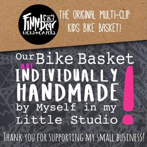 May include: An image promoting a kids' bike basket. The text reads "The Original Multi-Clip Kids Bike Basket!" and "Our Bike Basket are Individually Handmade by Myself in my Little Studio." The image has a black and brown background.