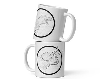 Taza de café de dinosaurio que representa un Triceratops y un T-Rex