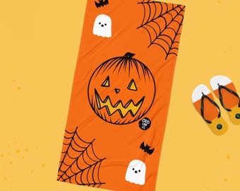 Jack o Lantern and Ghosts Halloween beach Towel