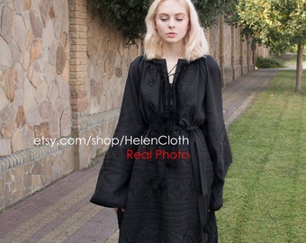 May include: A black embroidered dress with long sleeves and a tie at the neckline. The dress has a geometric pattern and is worn with white sneakers. The text "etsy.com/shop/HelenCloth Real Photo" is visible on the image.