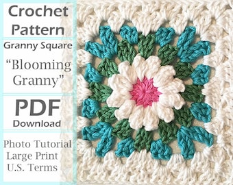May include: Crochet pattern for a granny square with a flower in the center. The flower is white with a pink center and is surrounded by green and blue crochet stitches. The text "Blooming Granny" and "PDF Download" is visible.