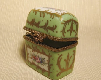 Limoges porcelain box in miniature. Hand painted. Rectangular, high box. Flowers and green background