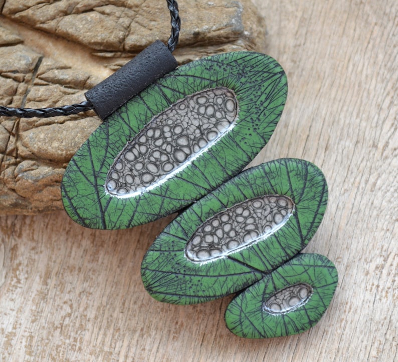 Dark green statement leather necklace.