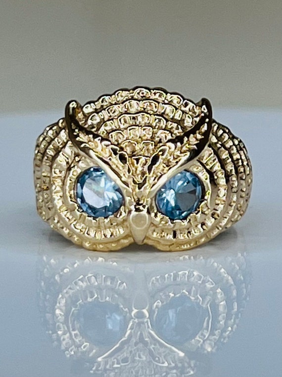 Gold feather ring with - Gem